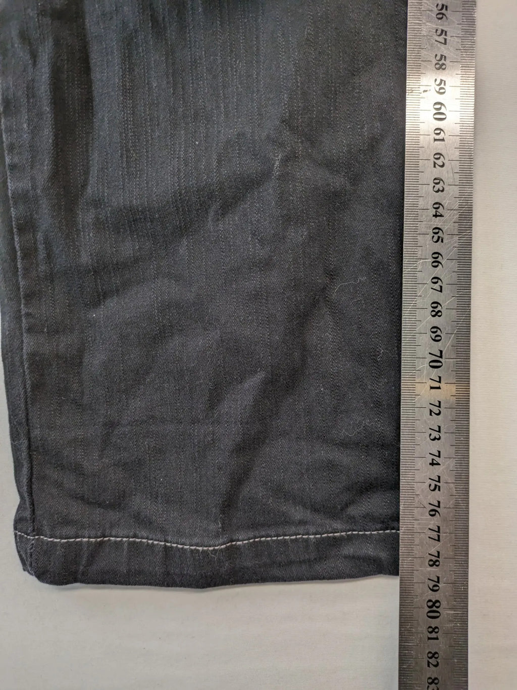 Okay grey straight jeans with contrast stitching and three-button closure, cotton stretch material.