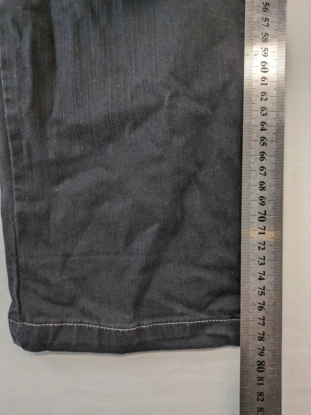 Okay grey straight jeans with contrast stitching and three-button closure, cotton stretch material.