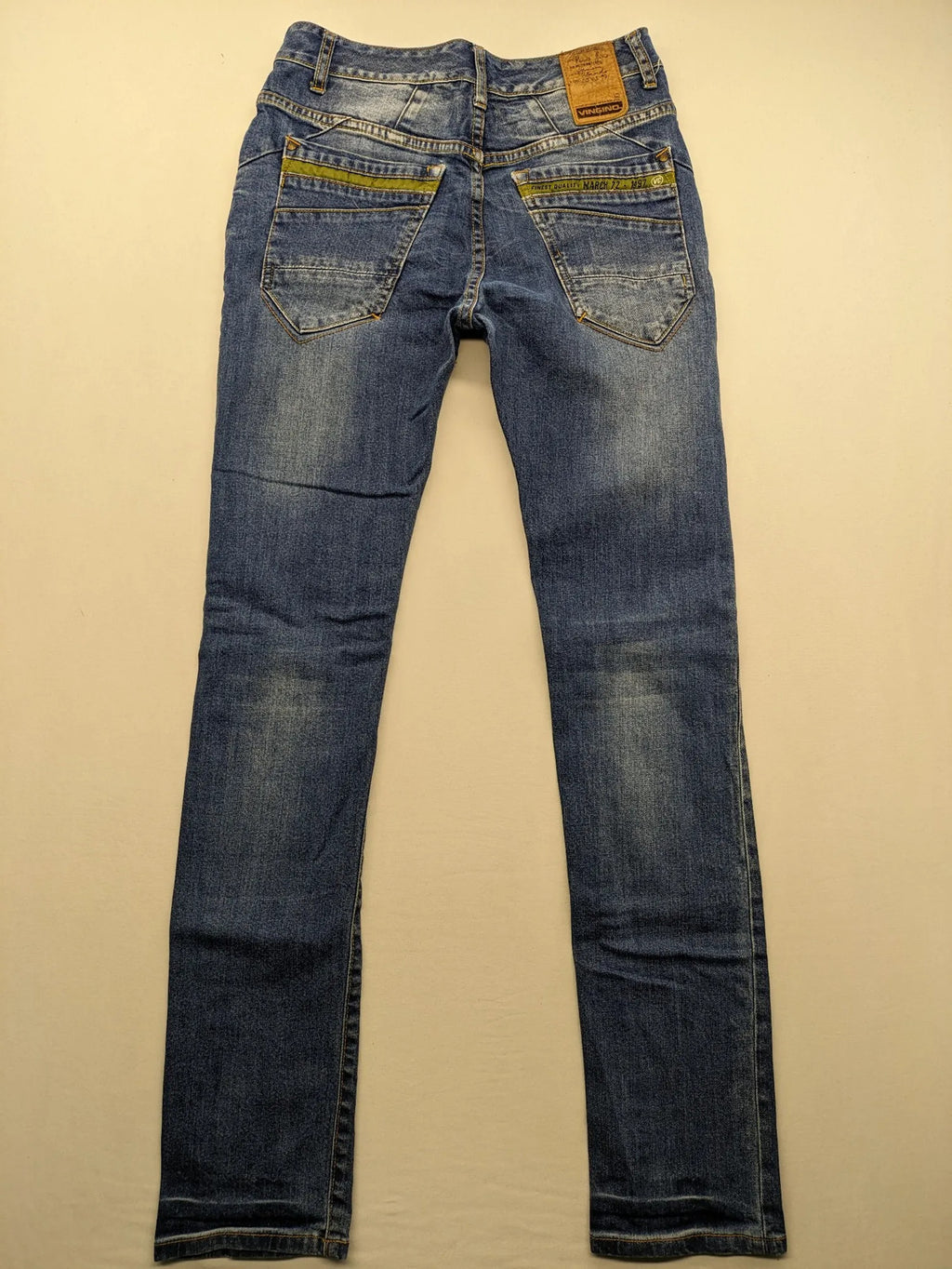 Vingino blue skinny jeans with adjustable waistband and classic wash, made from stretch denim.