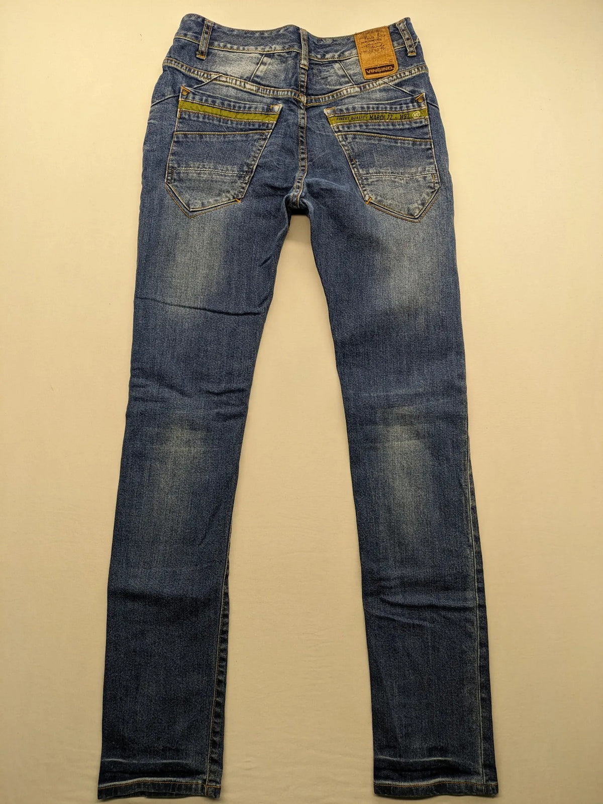 Vingino blue skinny jeans with adjustable waistband and classic wash, made from stretch denim.