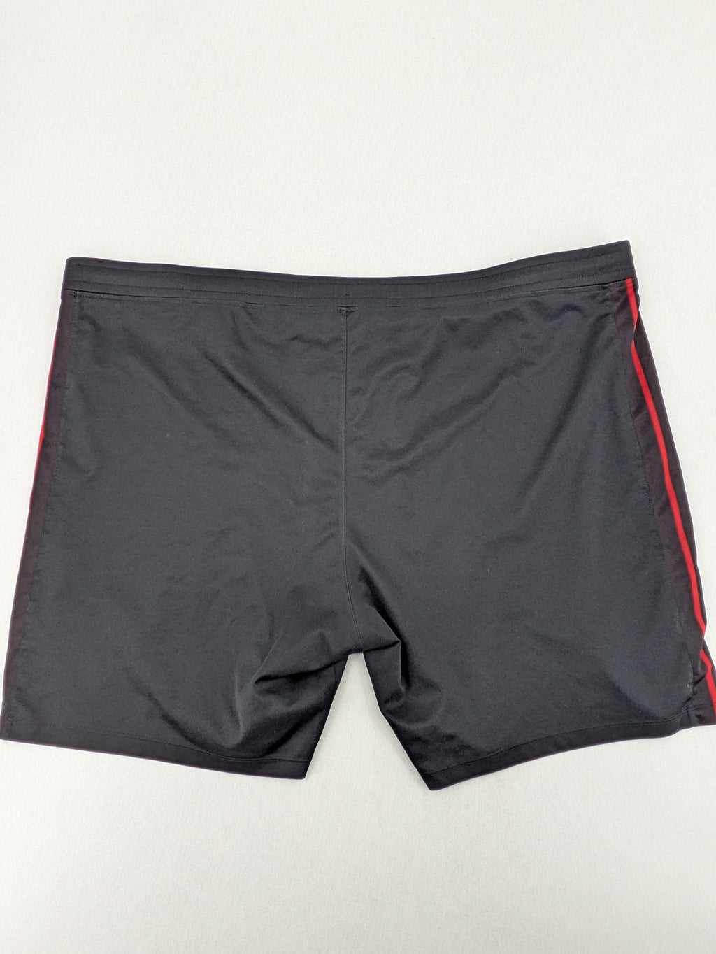 Bayer black training shorts with red side stripes, embroidered team crest and Castore logo.