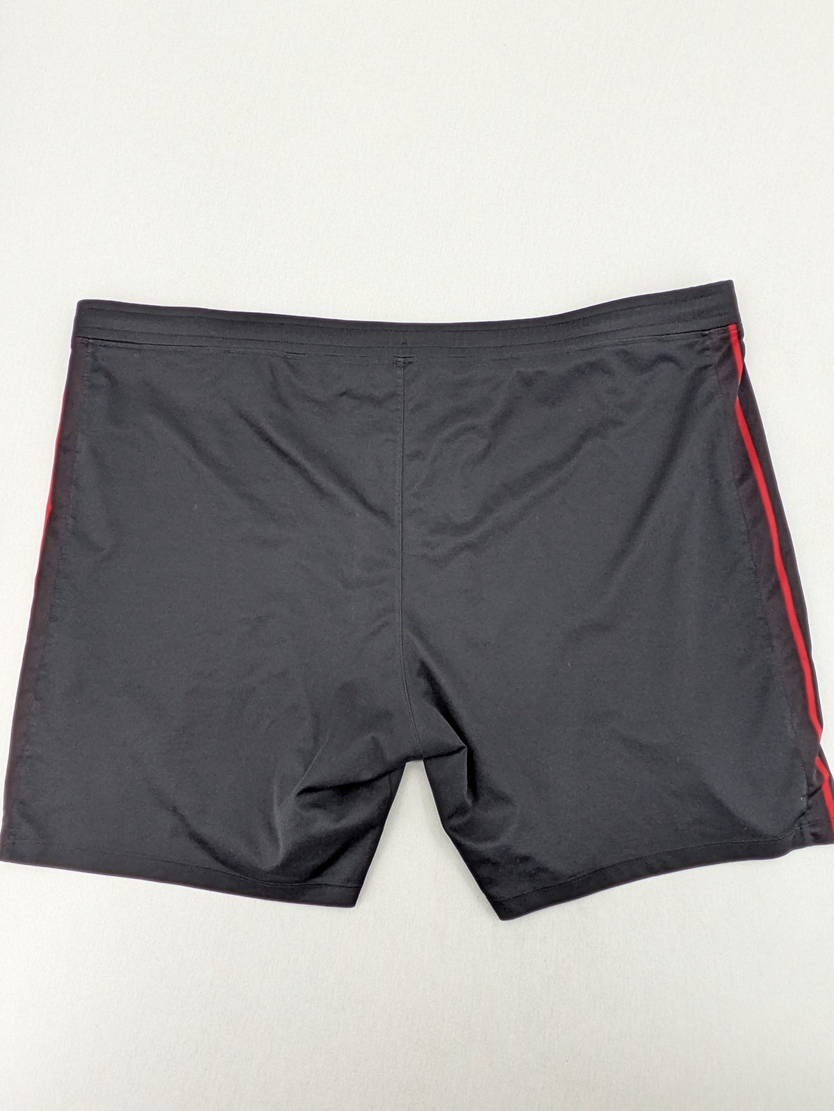 Bayer black training shorts with red side stripes, embroidered team crest and Castore logo.