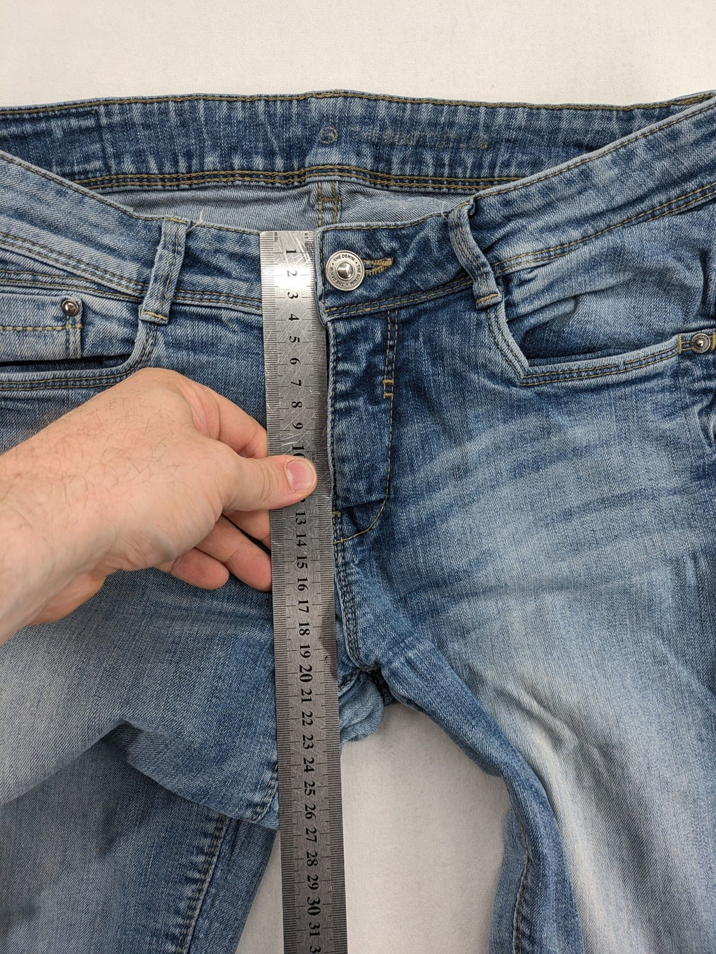 C&A blue bootcut jeans with faded denim and low rise fit, made from cotton blend.