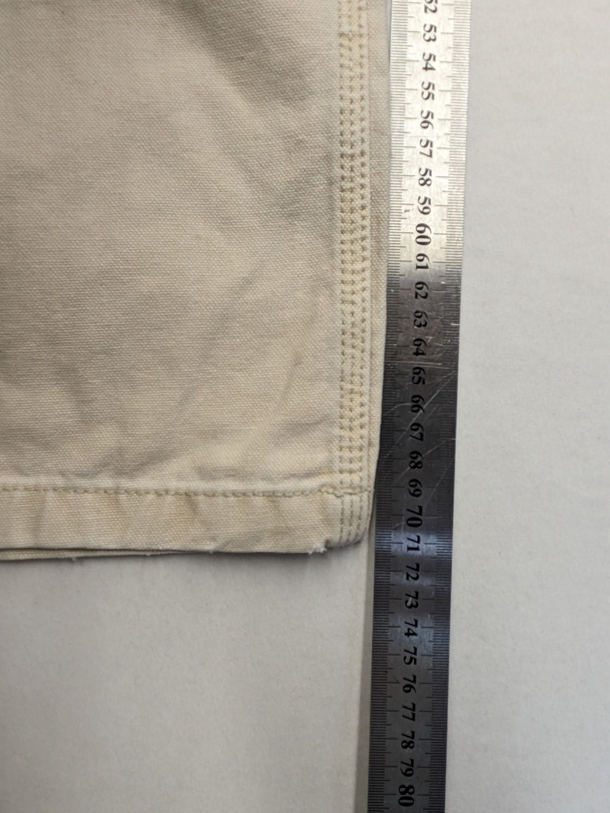 Pull&Bear beige carpenter pants with classic zipper, belt loops, and durable cotton material.