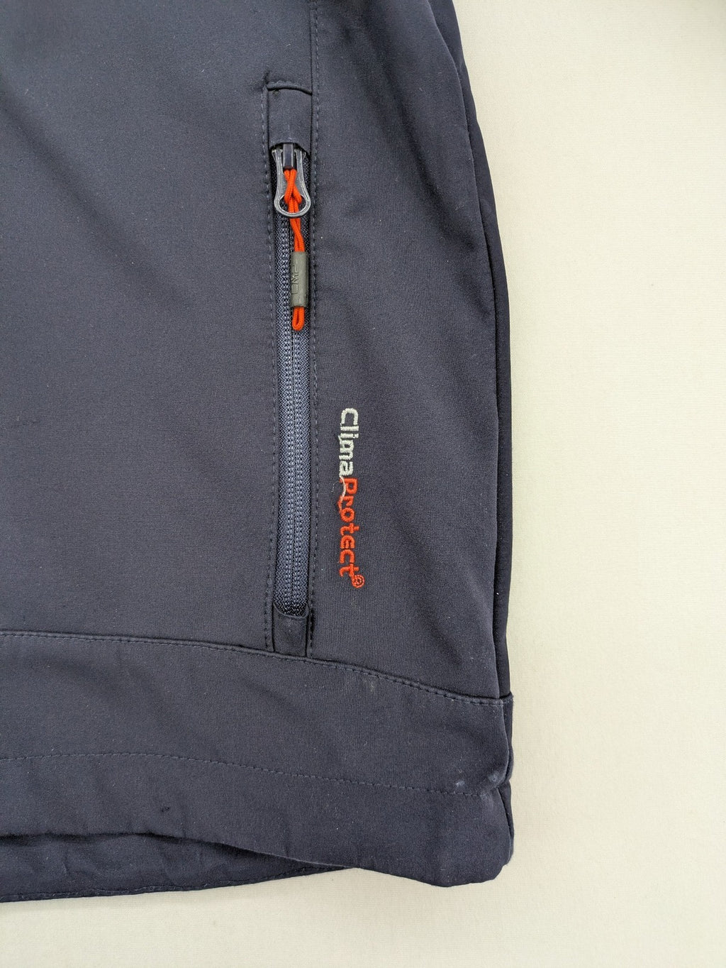cmp green and navy softshell jacket with Clima Protect logo and fleece lining