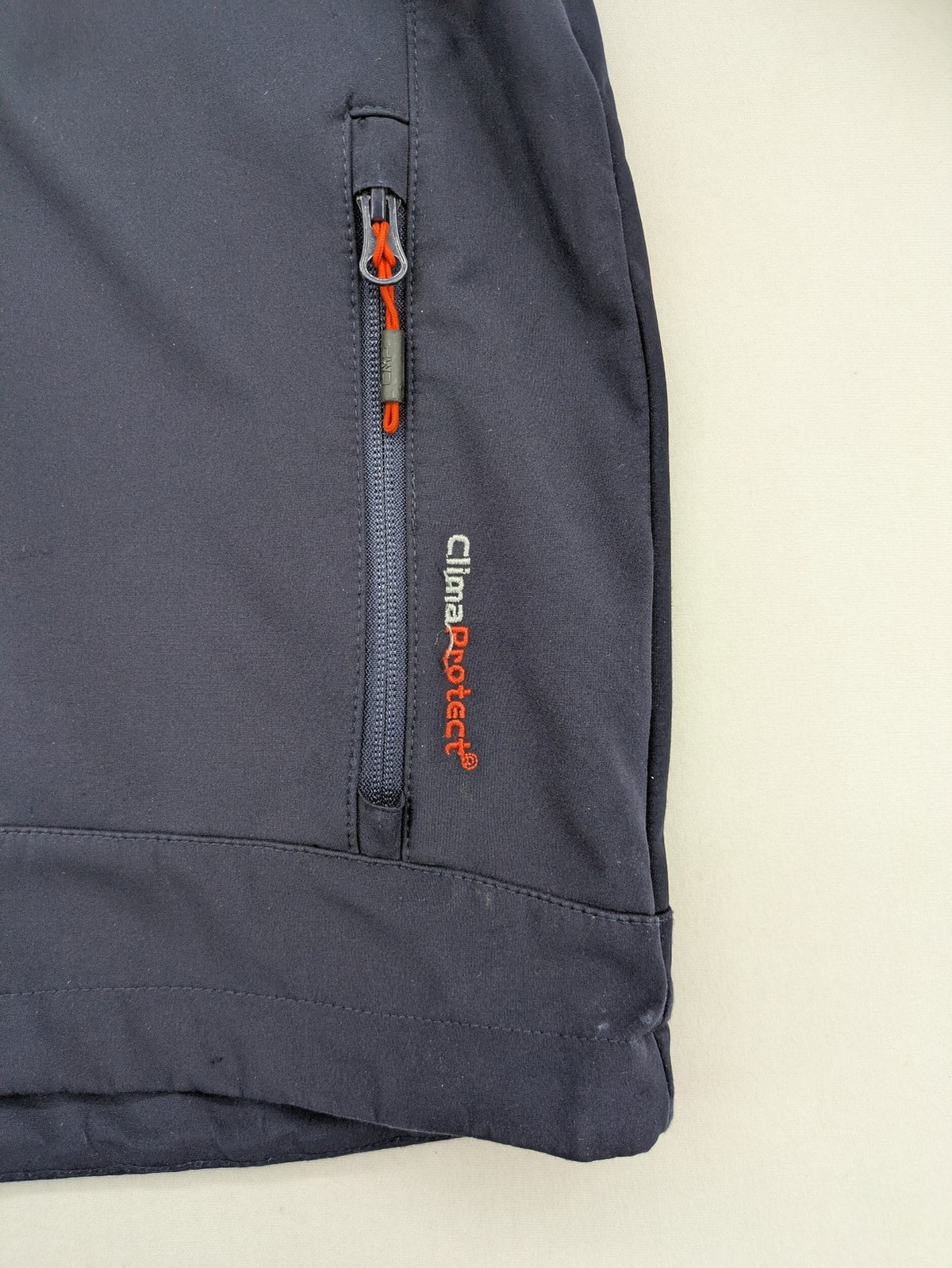 cmp green and navy softshell jacket with Clima Protect logo and fleece lining