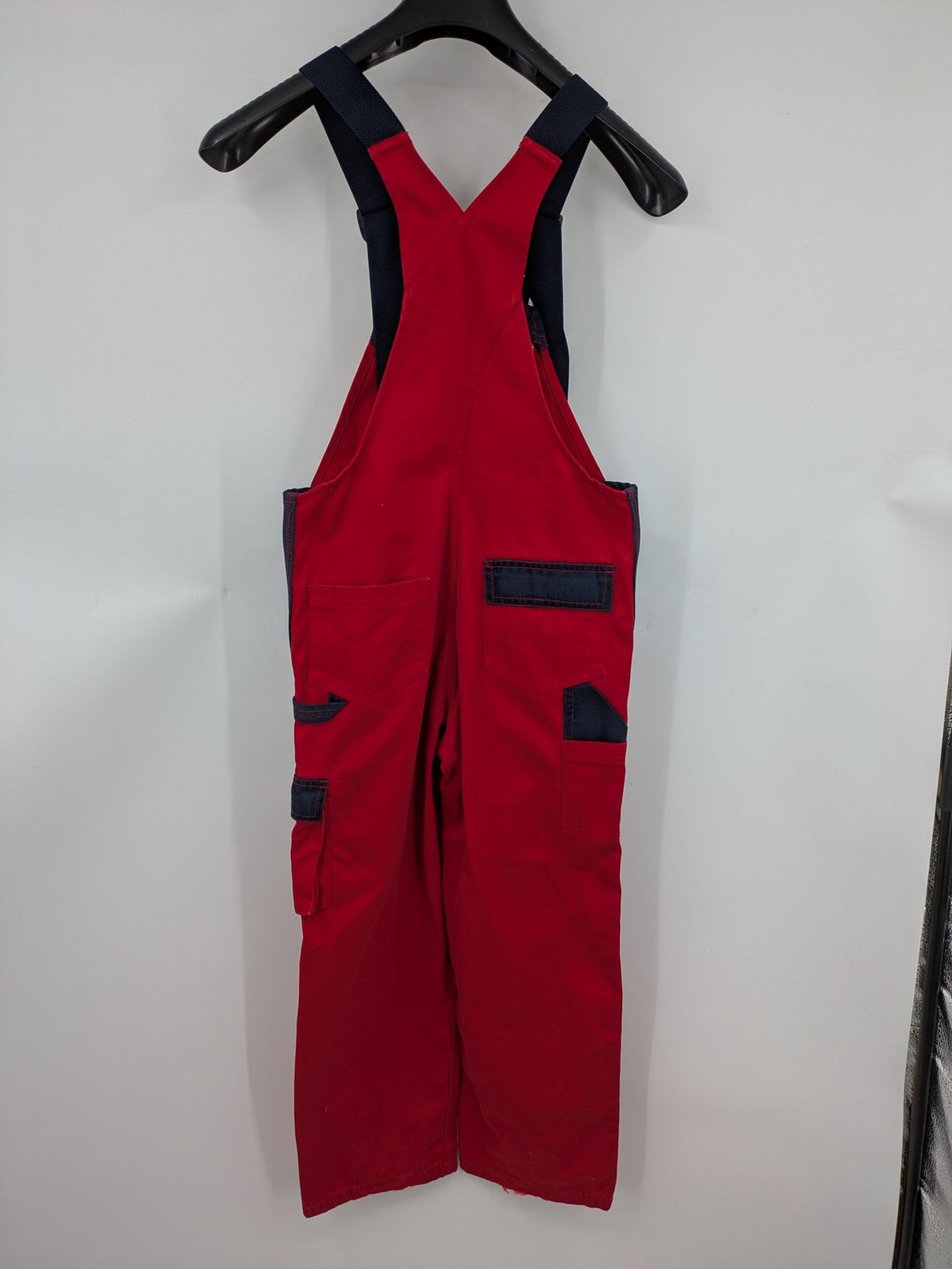 Grene navy red overall with adjustable straps, multiple pockets, and durable material.