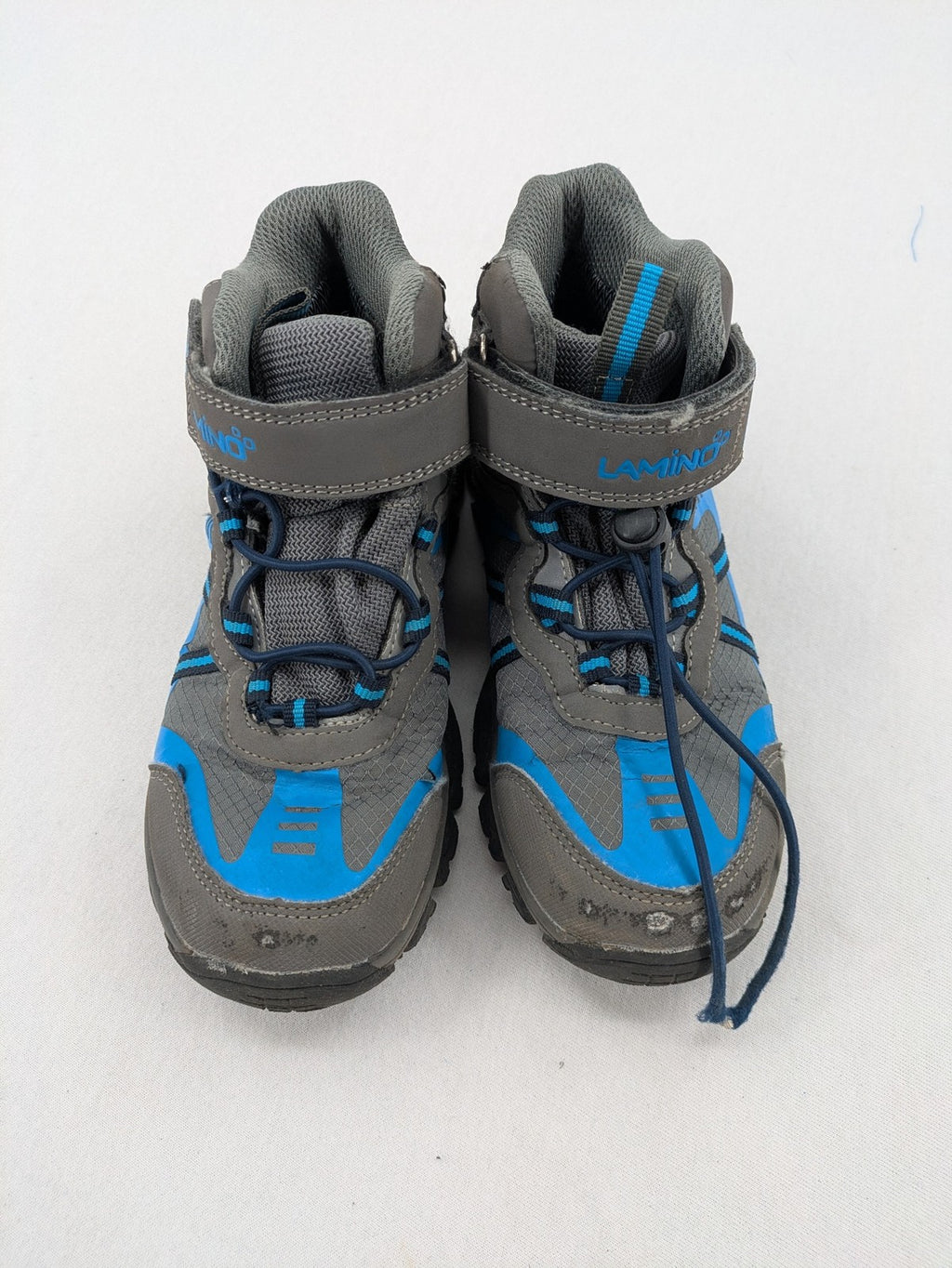 Outdoor grey and blue winter boots with high shaft, Velcro closure, and textured sole.