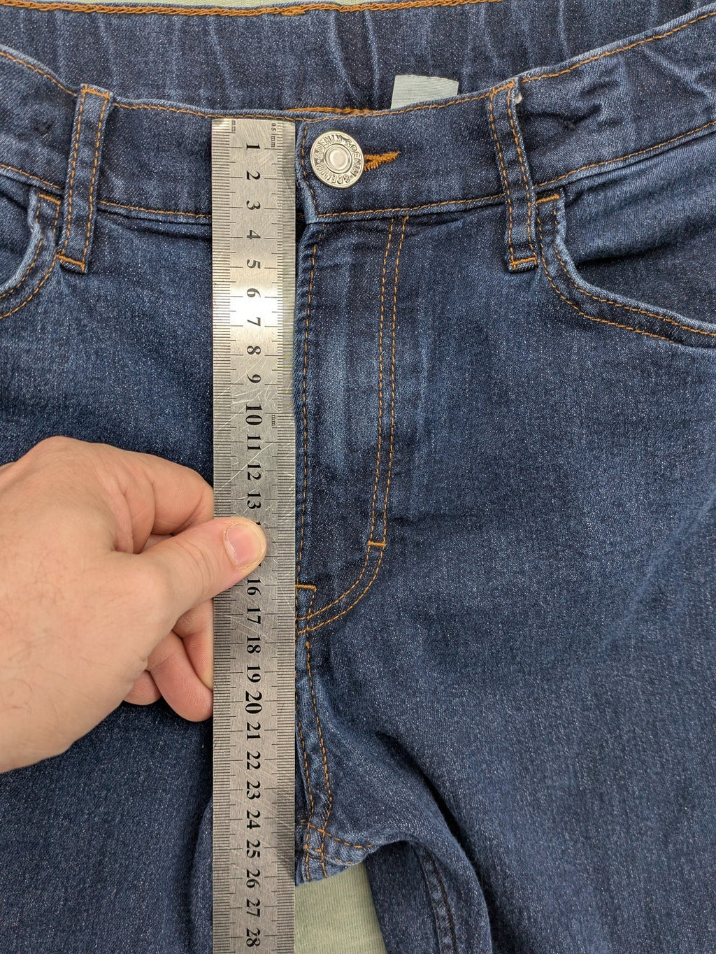 H&M blue straight jeans with adjustable waistband and classic 5-pocket design.