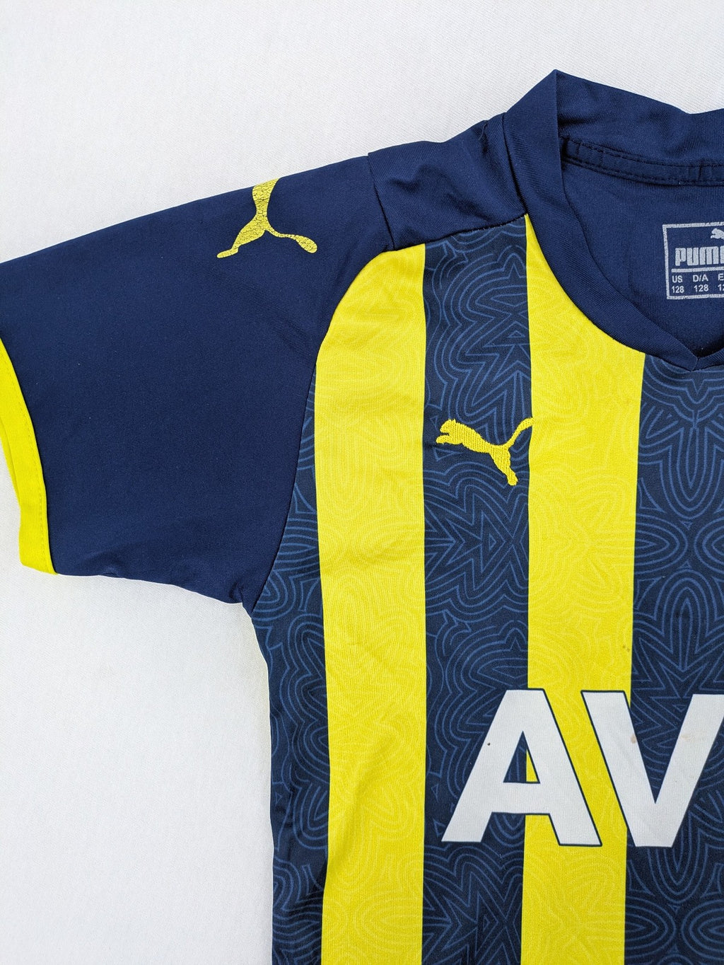 Puma Fenerbahçe kids jersey navy yellow with striped pattern and embroidered club logo.