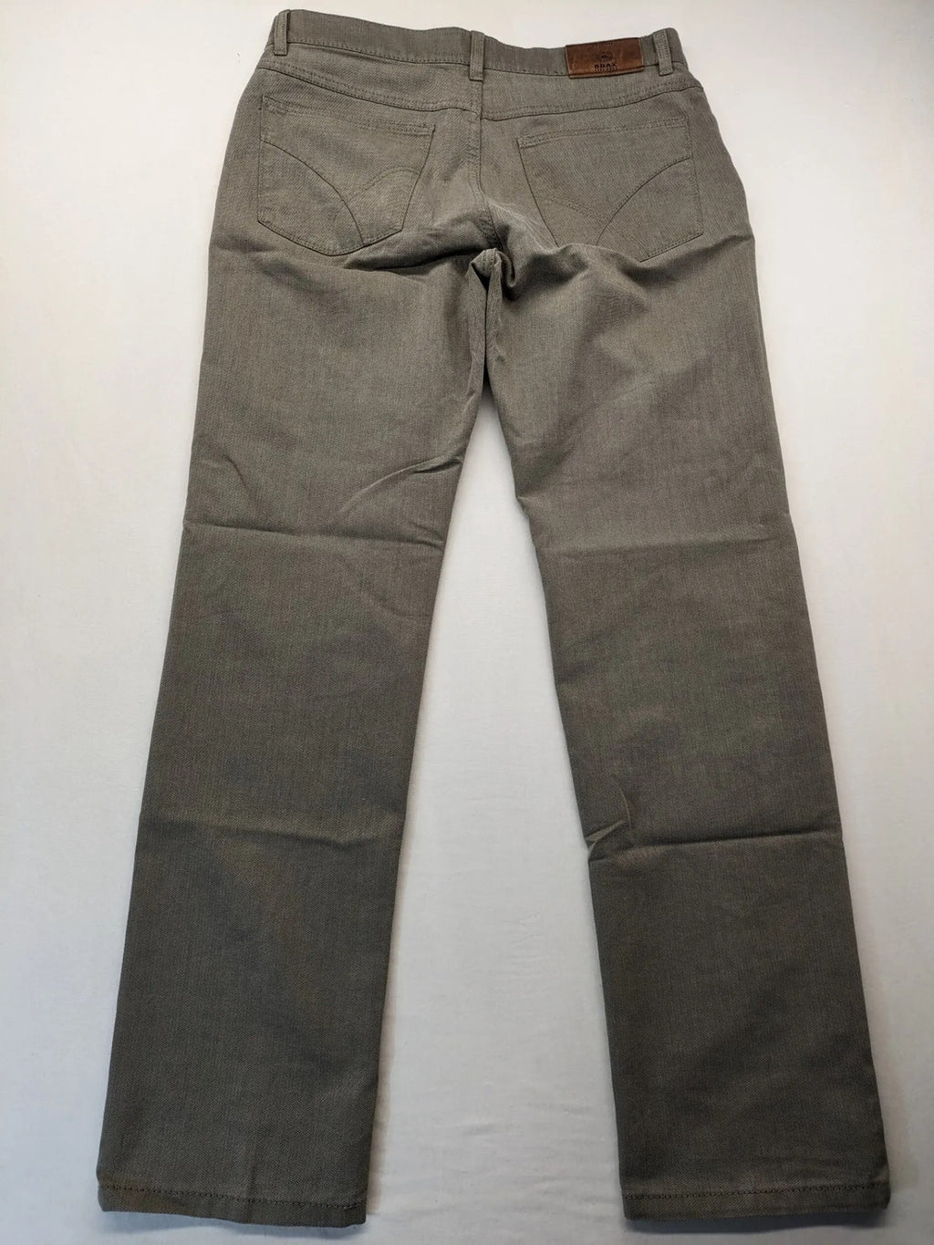 BRAX grey straight jeans 5-pocket design with zipper fly and soft fabric.