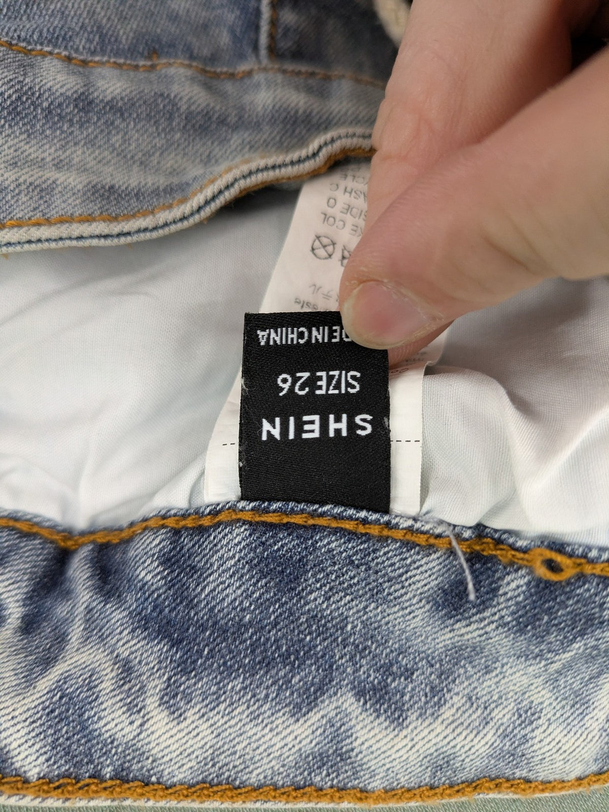 SHEIN blue straight jeans high waist with unique lacing details and stylish design.