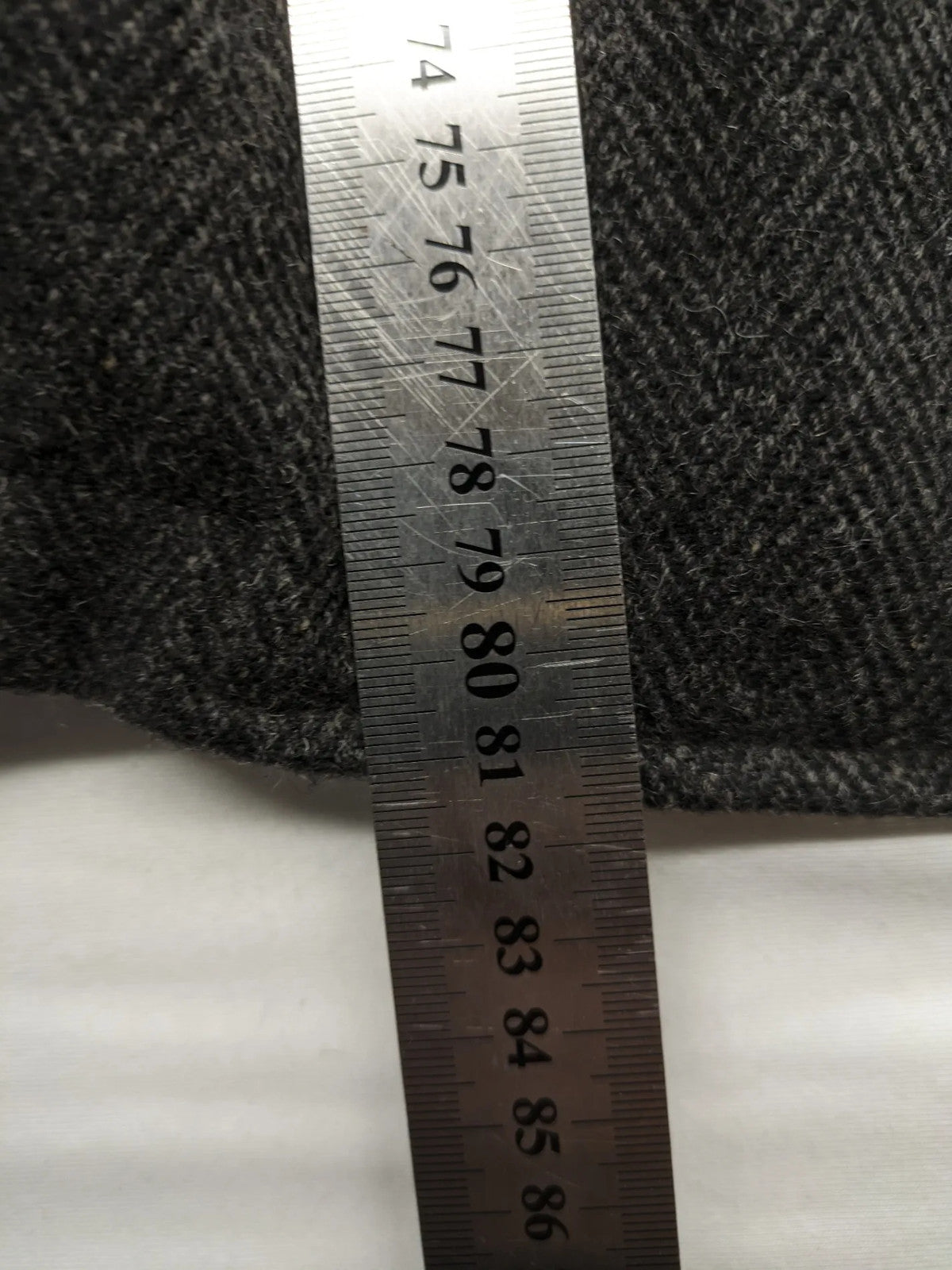 Jack & Jones grey coat herringbone pattern with two-button closure and side pockets.