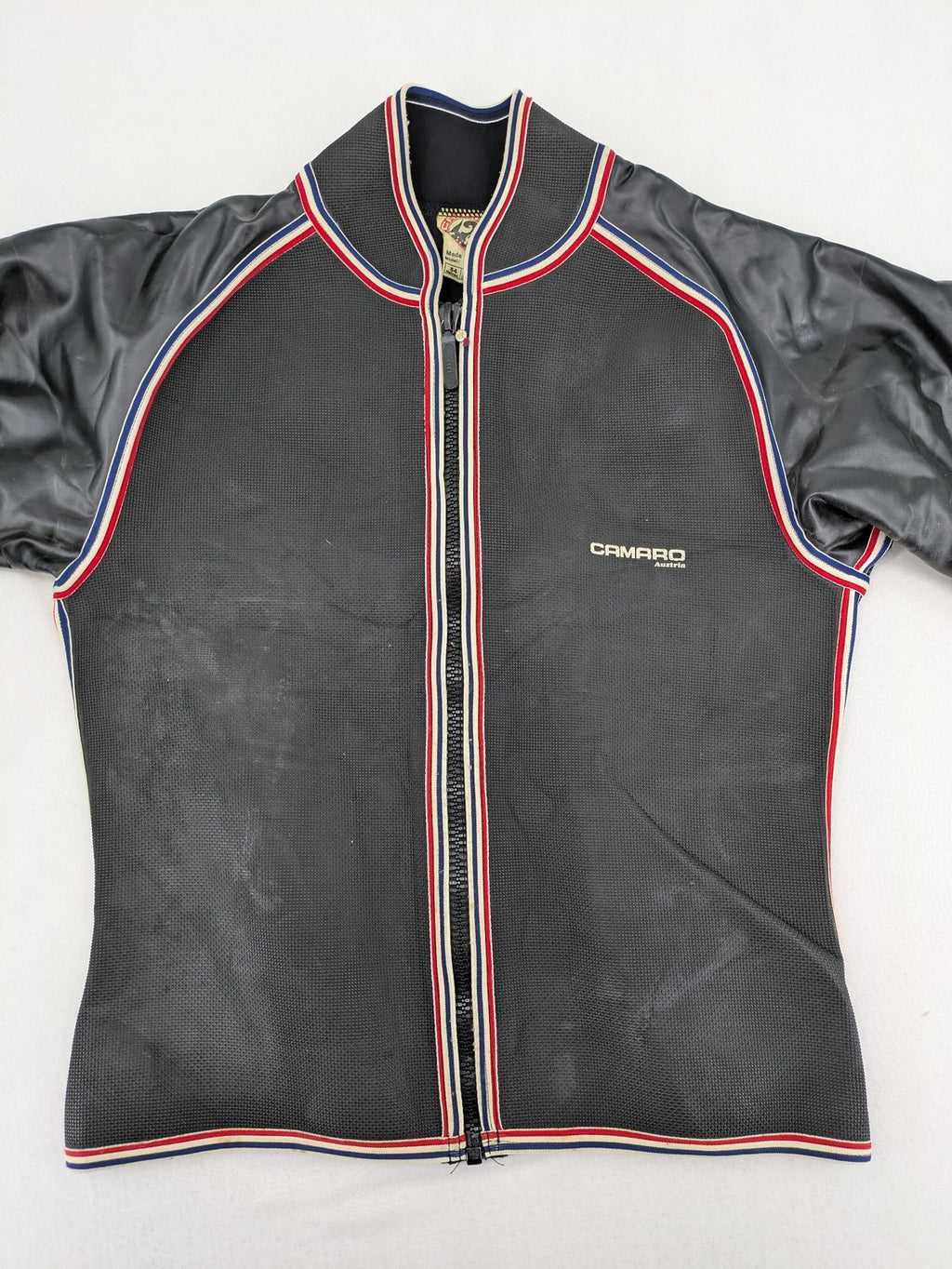 Camaro vintage jacket multi-colour with striped accents and structured body.