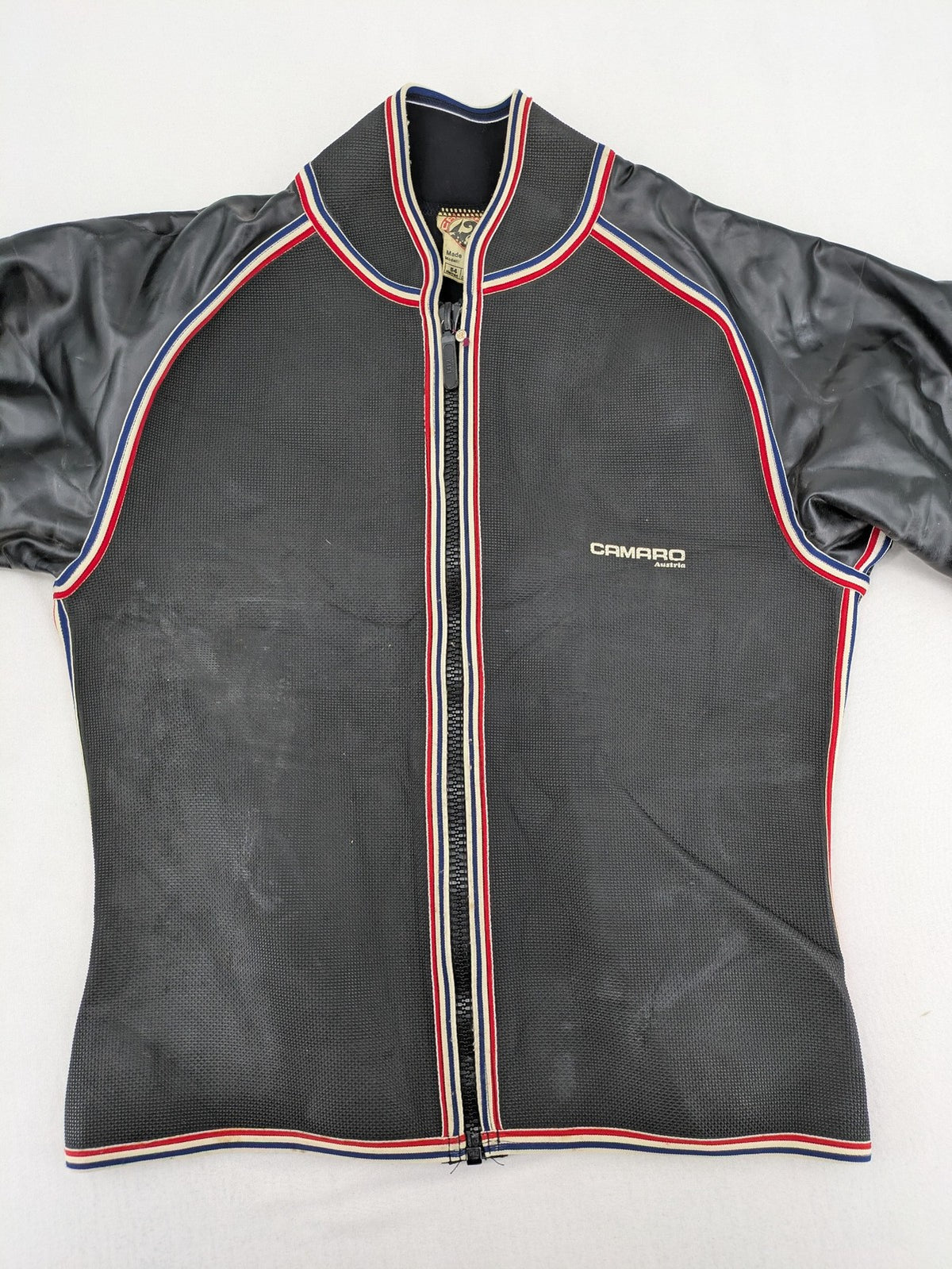 Camaro vintage jacket multi-colour with striped accents and structured body.