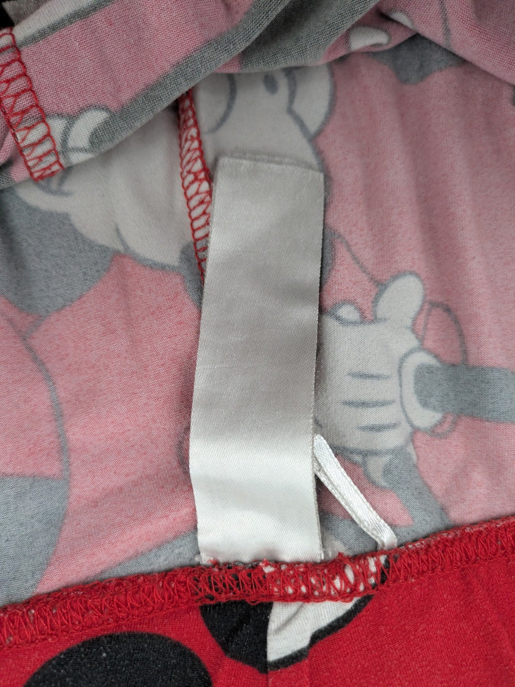 Disney loungewear set red and black with allover Mickey Mouse print and long sleeves.