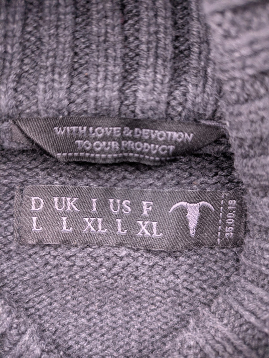 IZAC grey turtle neck jumper with cable knit pattern and used look finish.