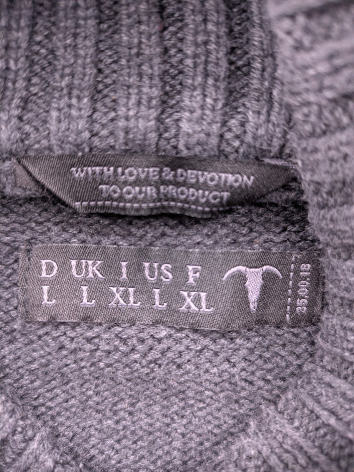 IZAC grey turtle neck jumper with cable knit pattern and used look finish.