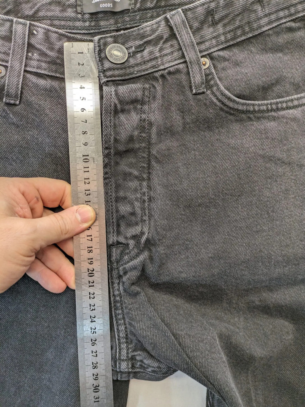 Jack & Jones grey loose fit jeans with classic button fly and 5-pocket design.