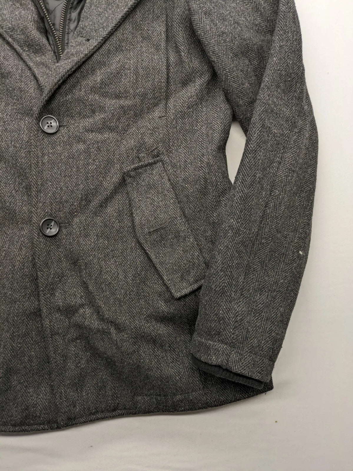 Jack & Jones grey coat herringbone pattern with two-button closure and side pockets.