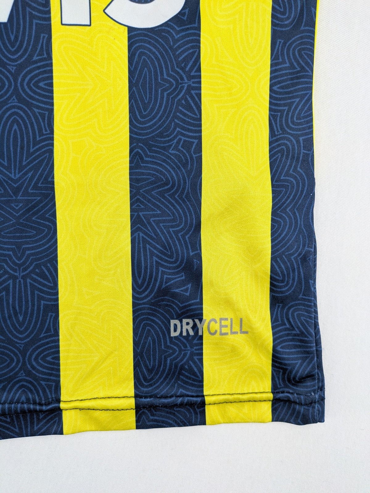 Puma Fenerbahçe kids jersey navy yellow with striped pattern and embroidered club logo.