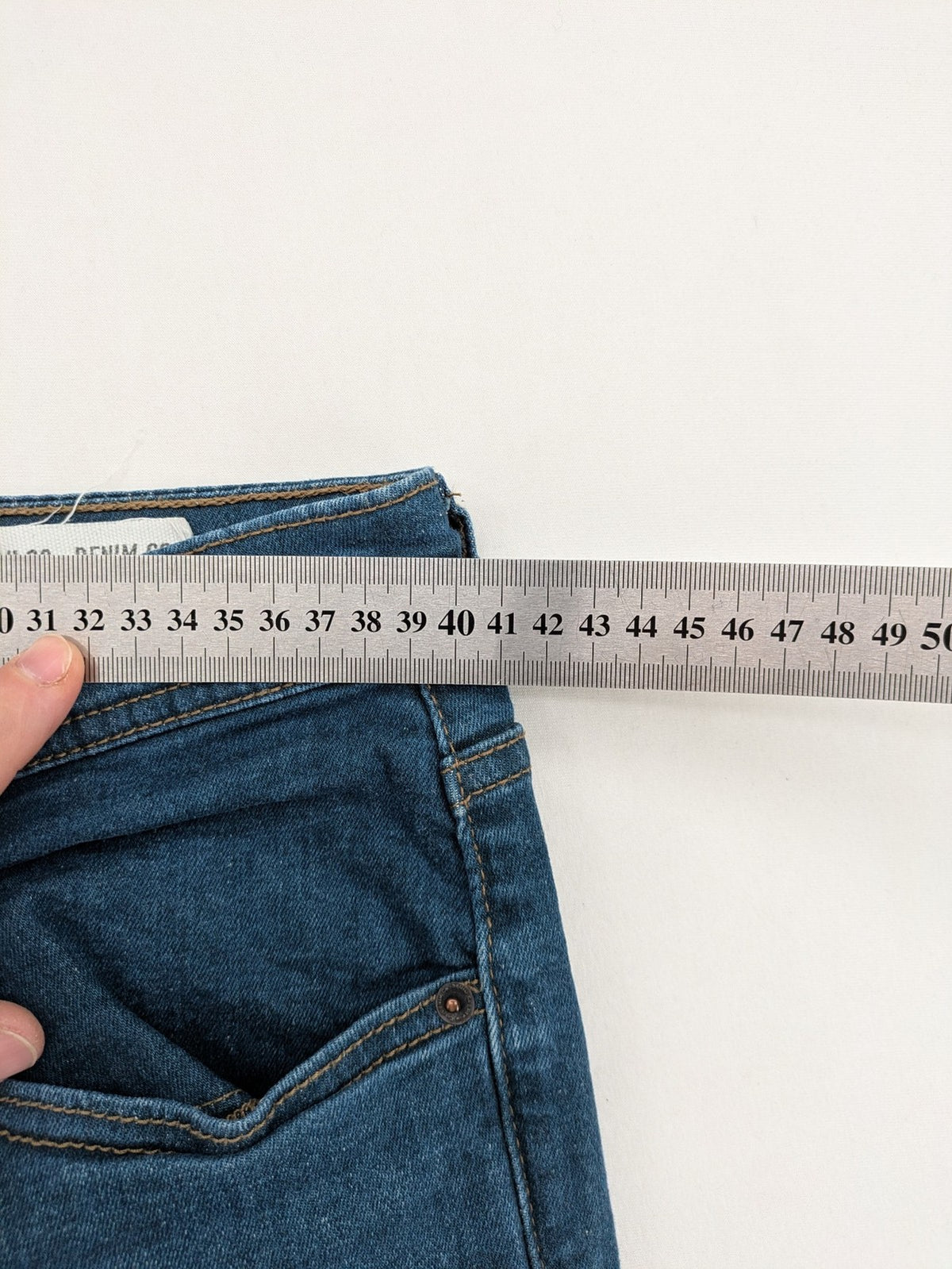 Denim & Co. blue straight fit jeans, classic 5-pocket design, button fly, cotton blend.
