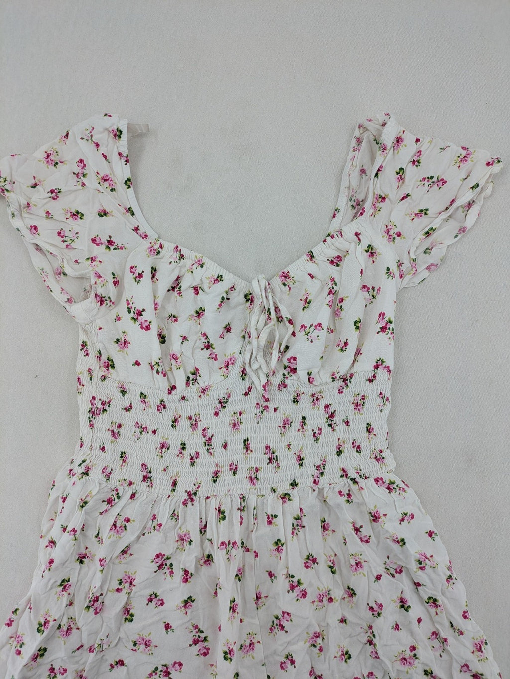 FB Sister floral playsuit white with pink flowers, smocked bodice, lightweight viscose material.