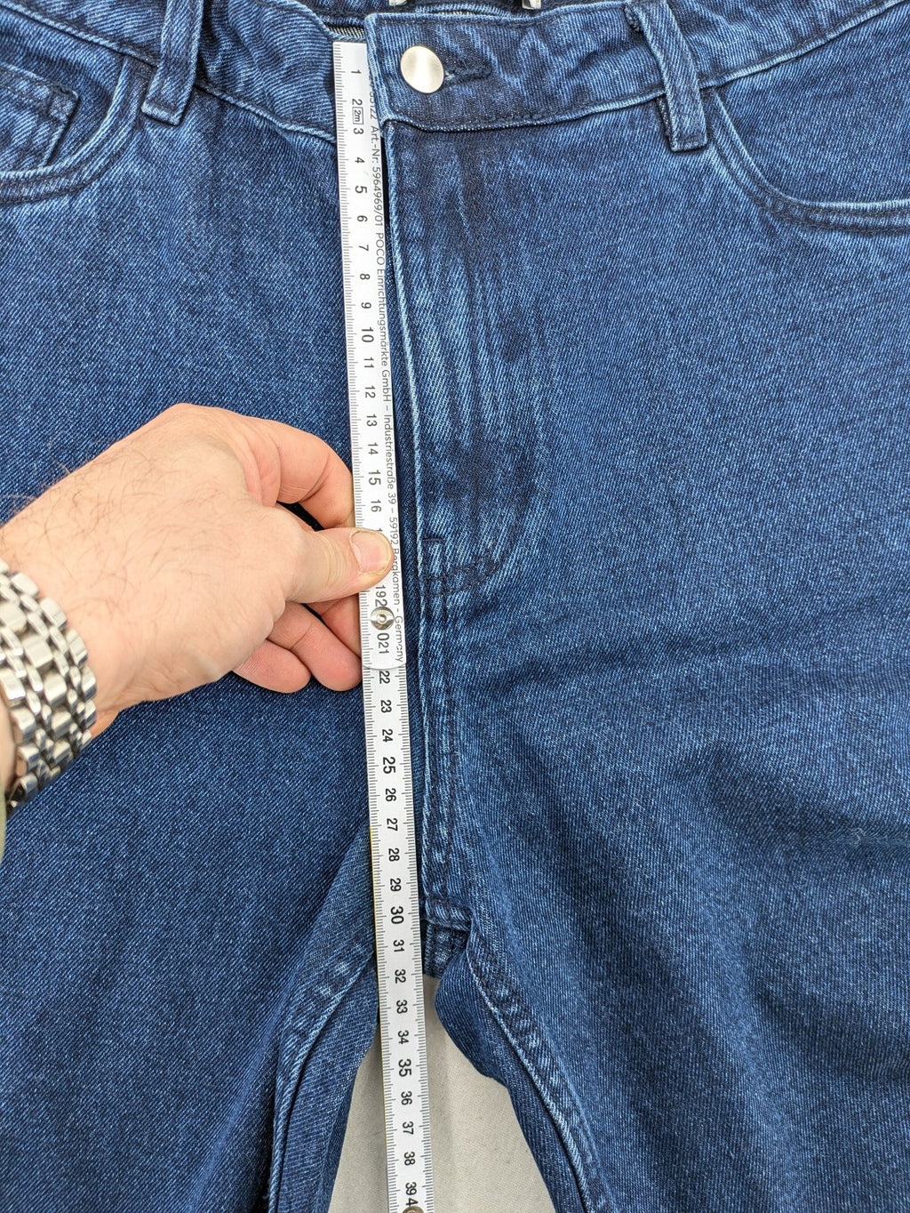 Tchibo blue straight jeans with five-pocket design and wide leg cut in durable cotton.