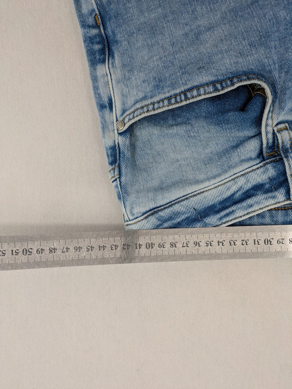 Oskar blue slim fit jeans with classic 5-pocket design and light wash.