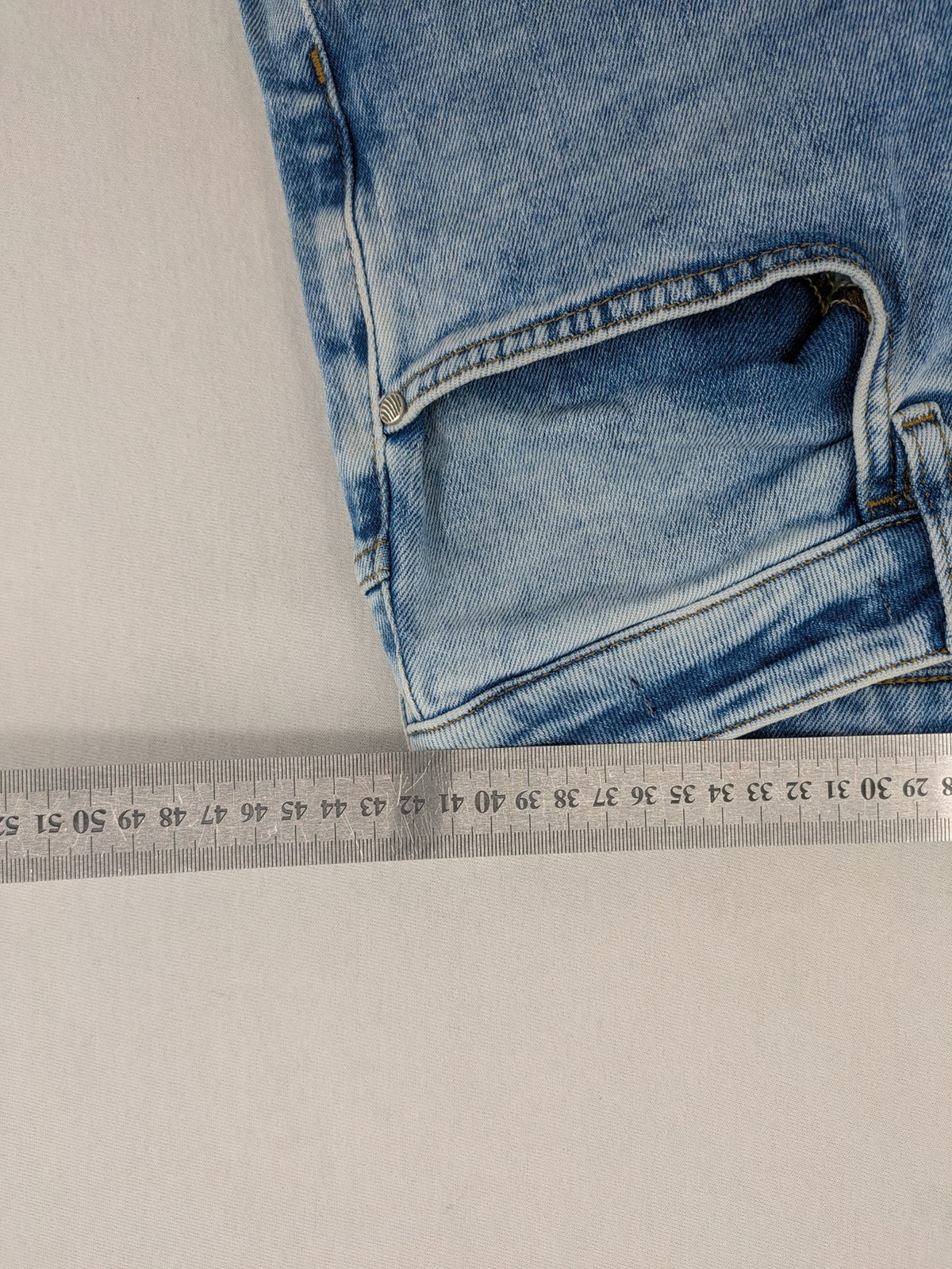 Oskar blue slim fit jeans with classic 5-pocket design and light wash.