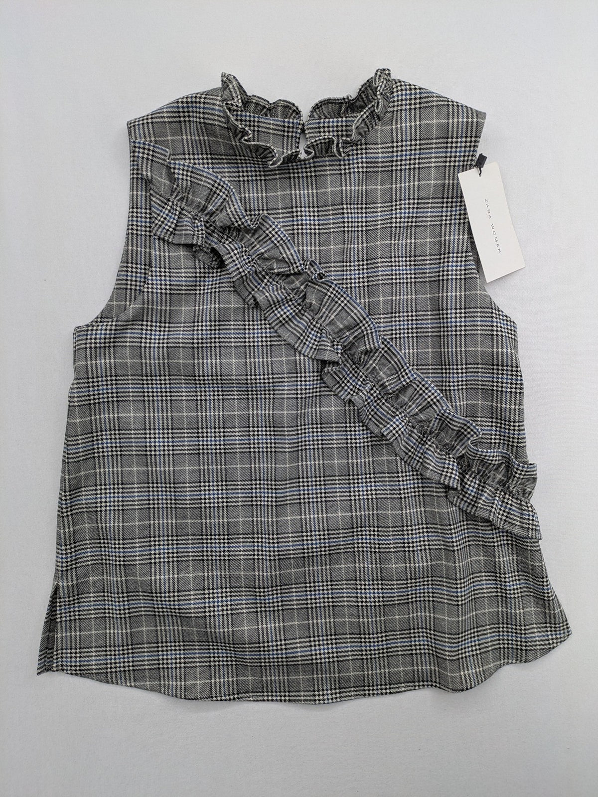 Zara ruffled sleeveless blouse grey check pattern high ruffle collar with blue, black, white accents