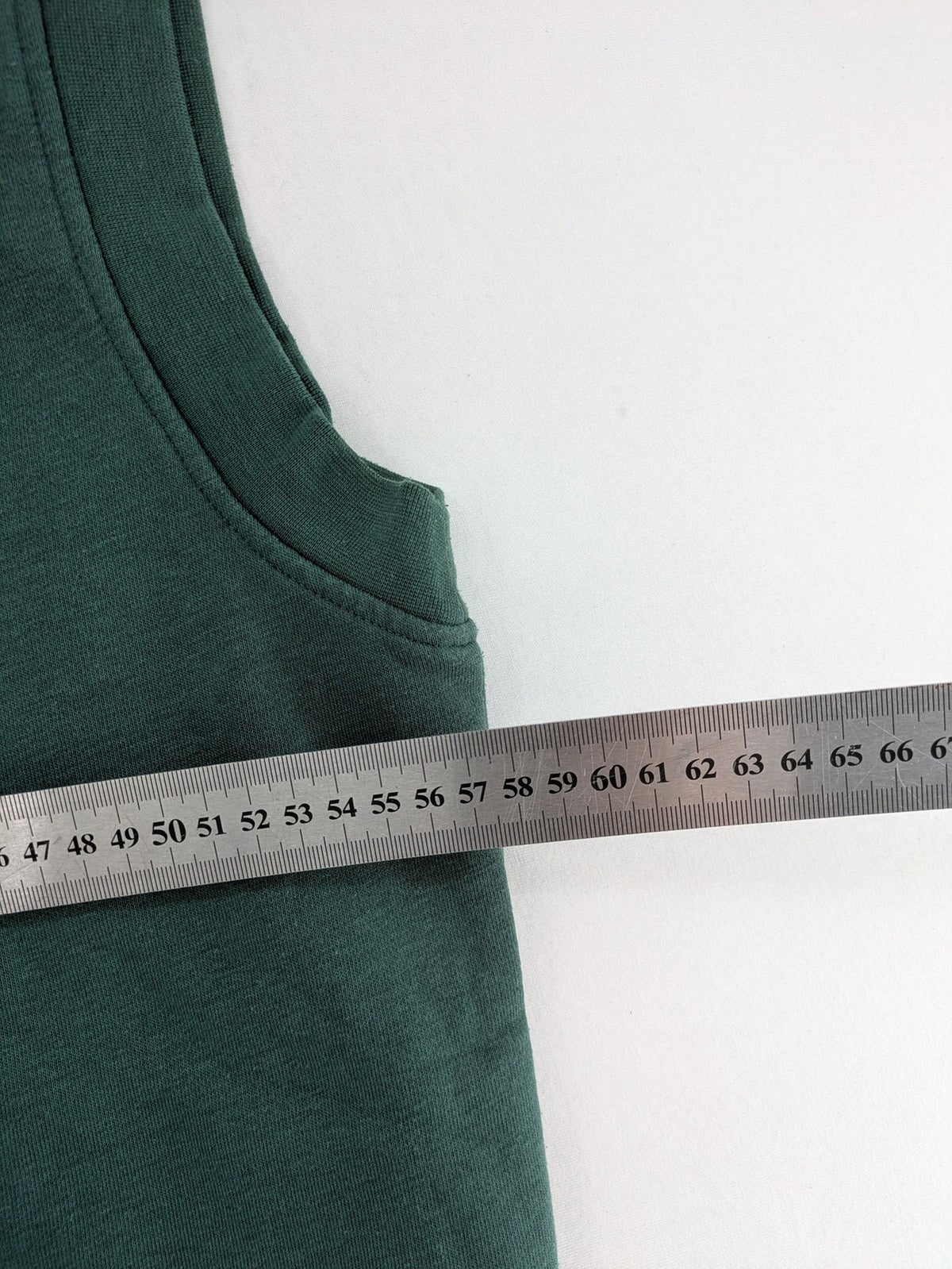 Jack & Jones Originals green vest with embroidered Athletic Club 1990 logo and V-neck.