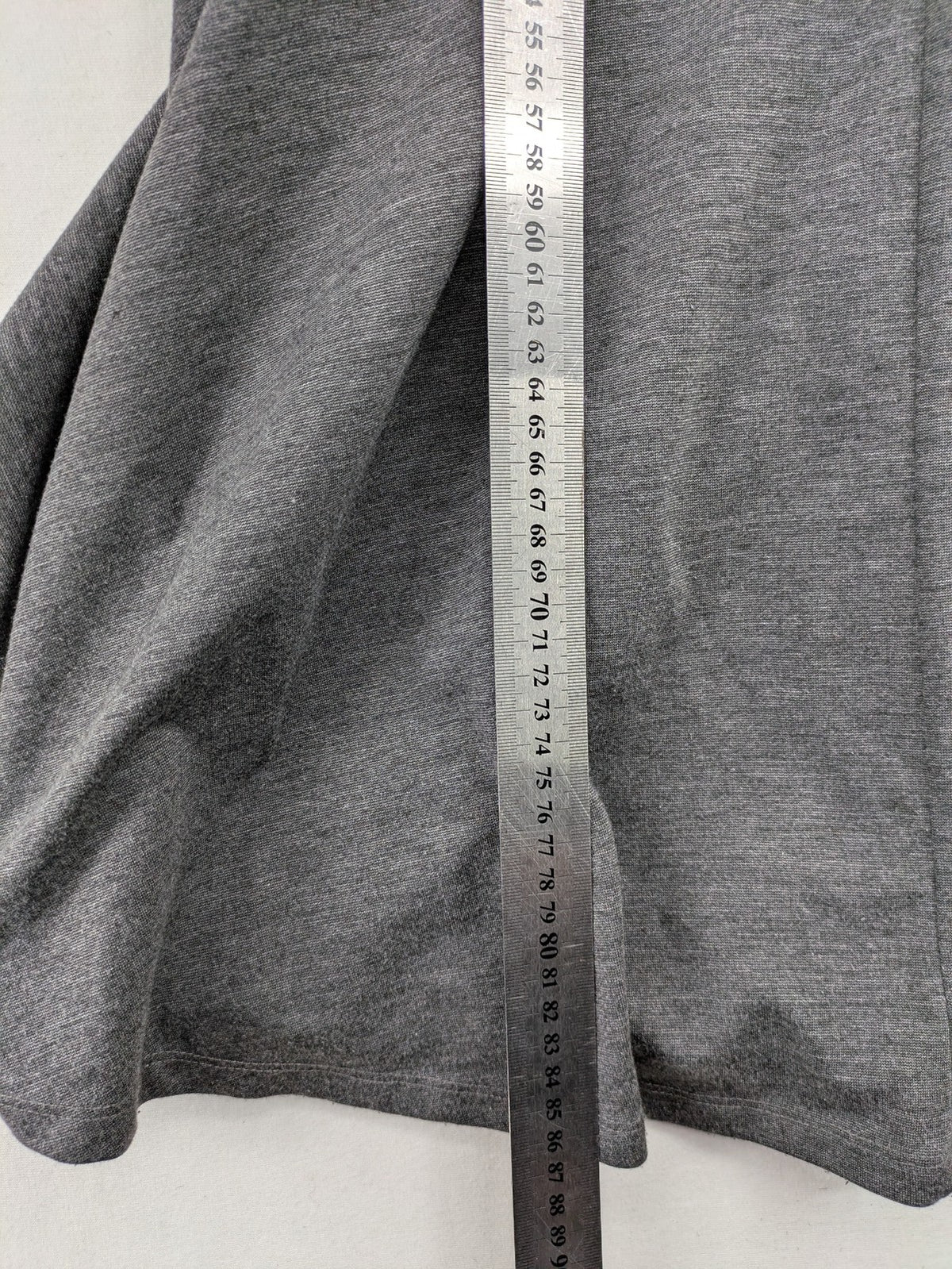 Ginatricot grey A-line skater dress with 3/4 sleeves and visible back zipper.