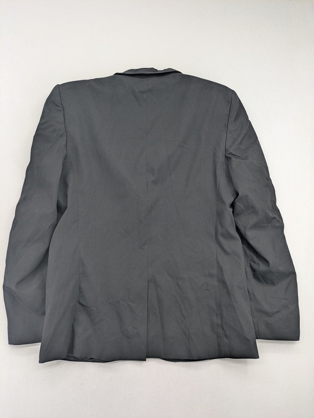 Zara Man grey blazer two-button design with structured silhouette and smooth lining.