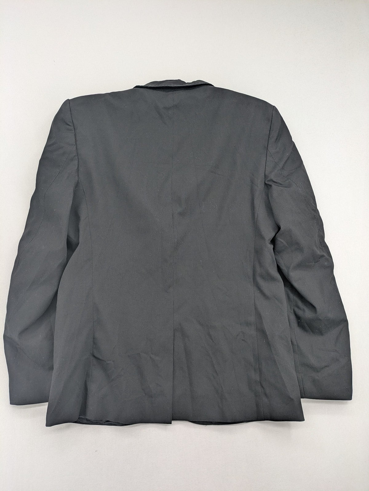 Zara Man grey blazer two-button design with structured silhouette and smooth lining.