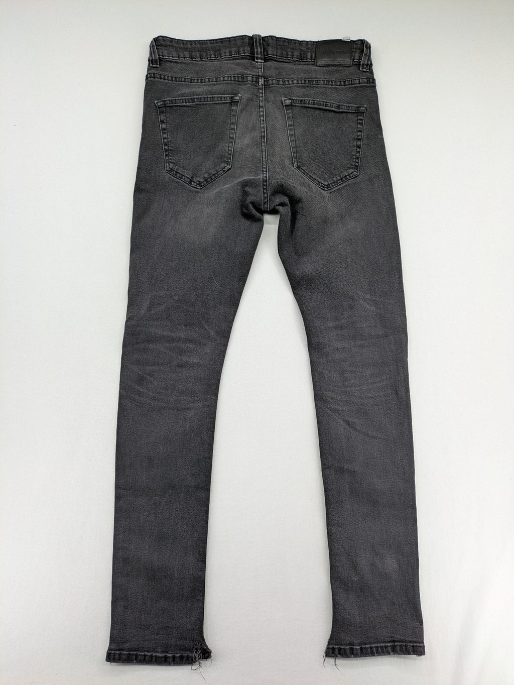 Only & Sons grey slim fit jeans with ripped details and open hem, stretch denim.