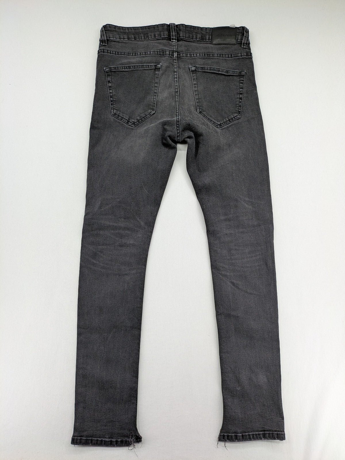 Only & Sons grey slim fit jeans with ripped details and open hem, stretch denim.