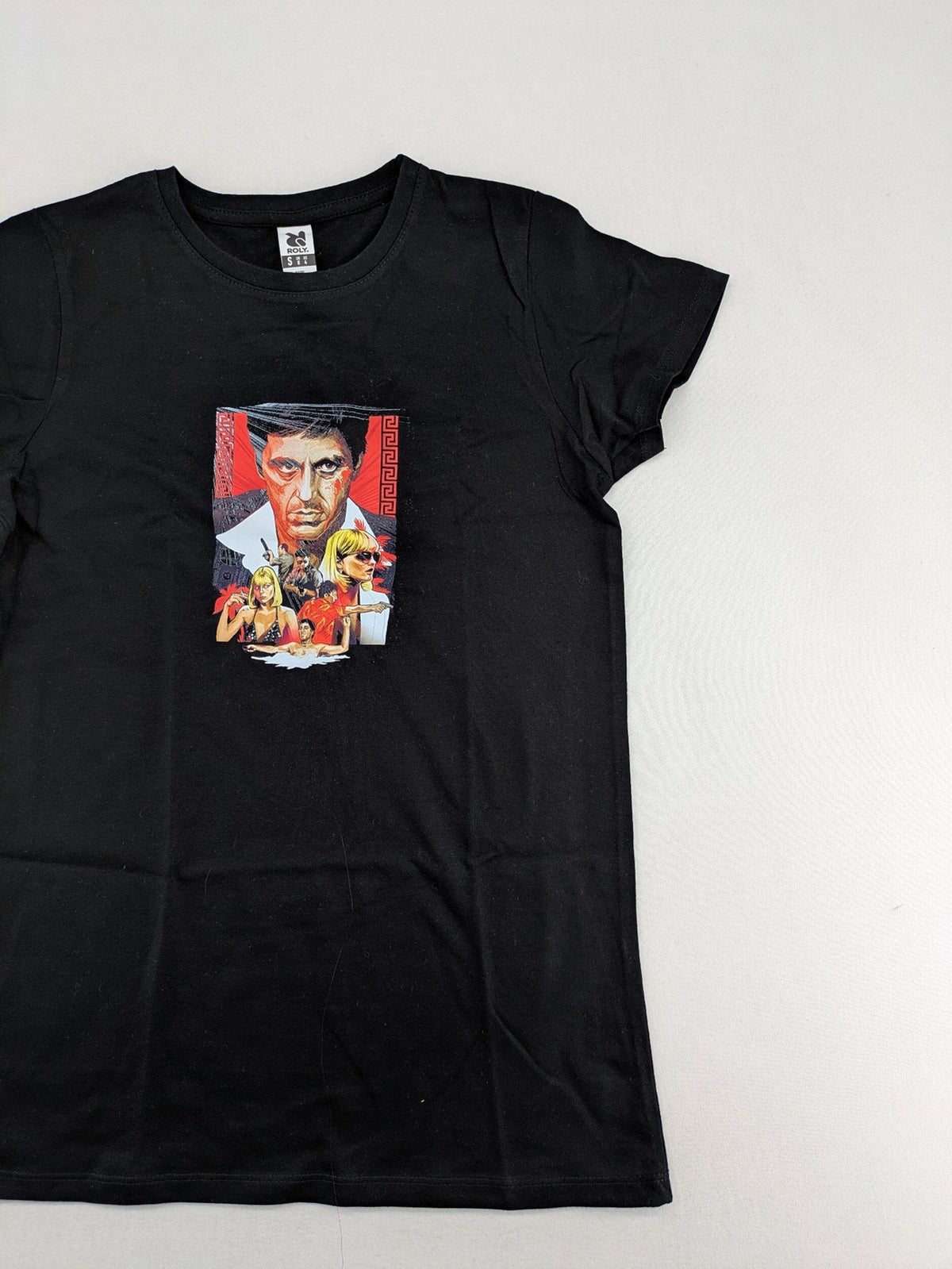 Scarface cream t-shirt featuring vibrant Tony Montana graphic print, made of 100% cotton.