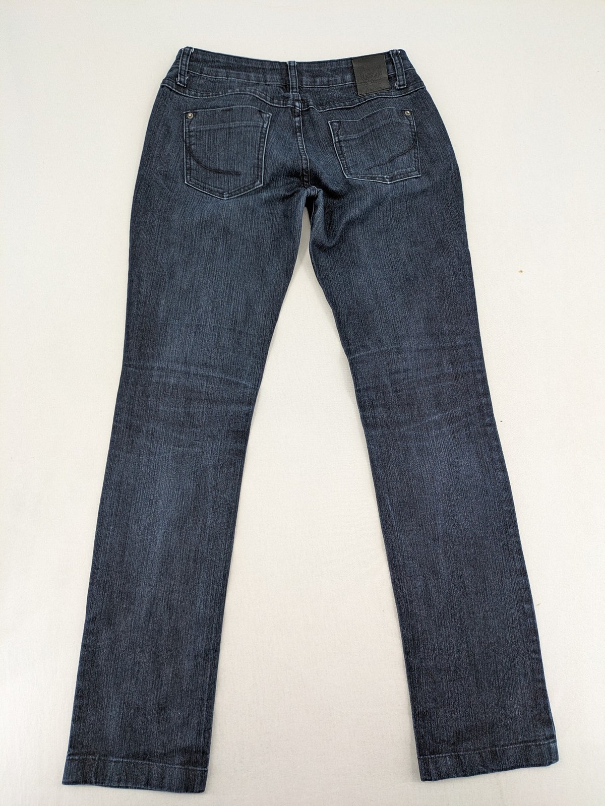 Review straight leg jeans dark blue low rise stretch denim with classic design.
