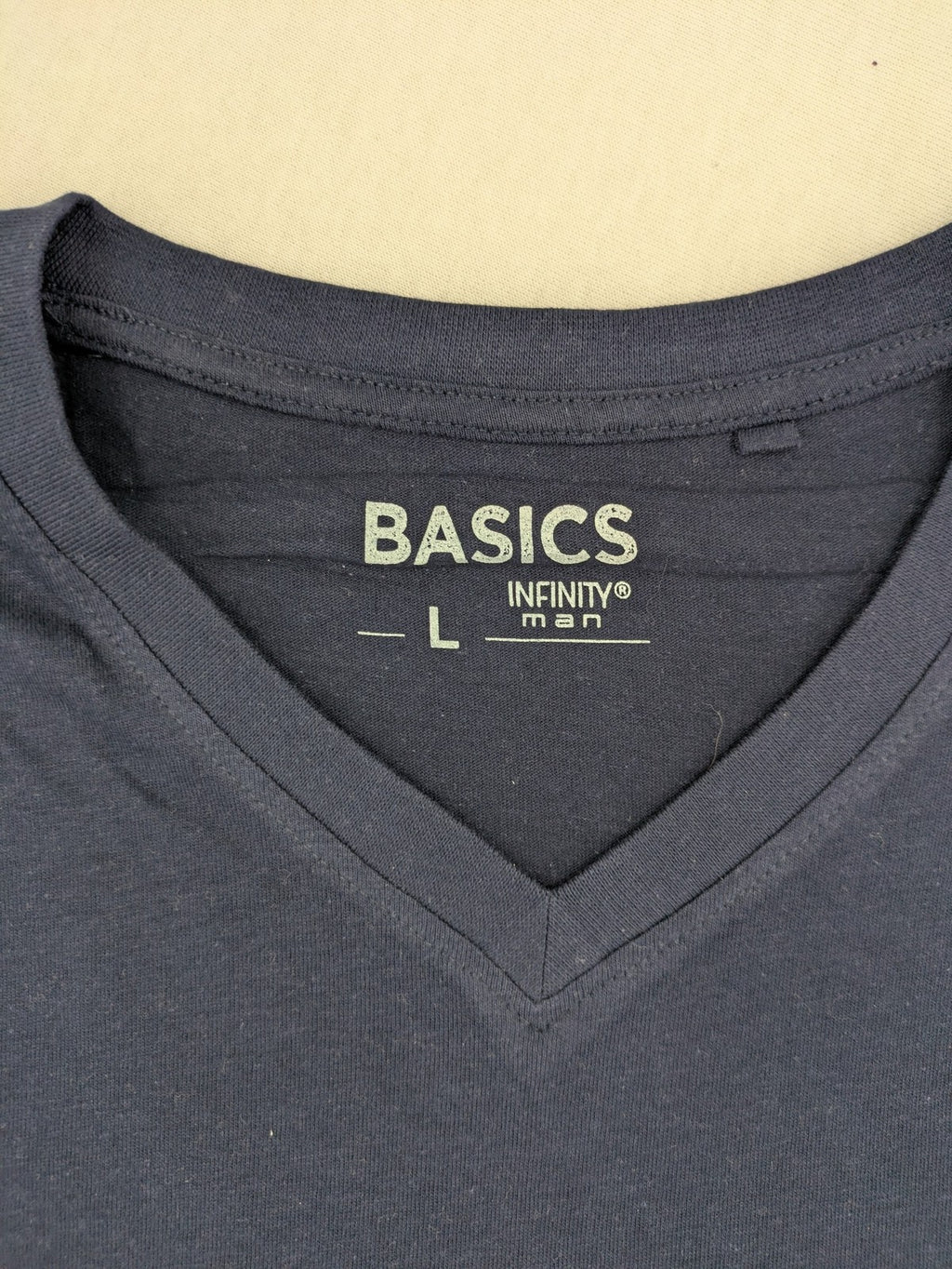 Helloween navy band T-shirt featuring iconic logo and pumpkin graphic, cotton material.