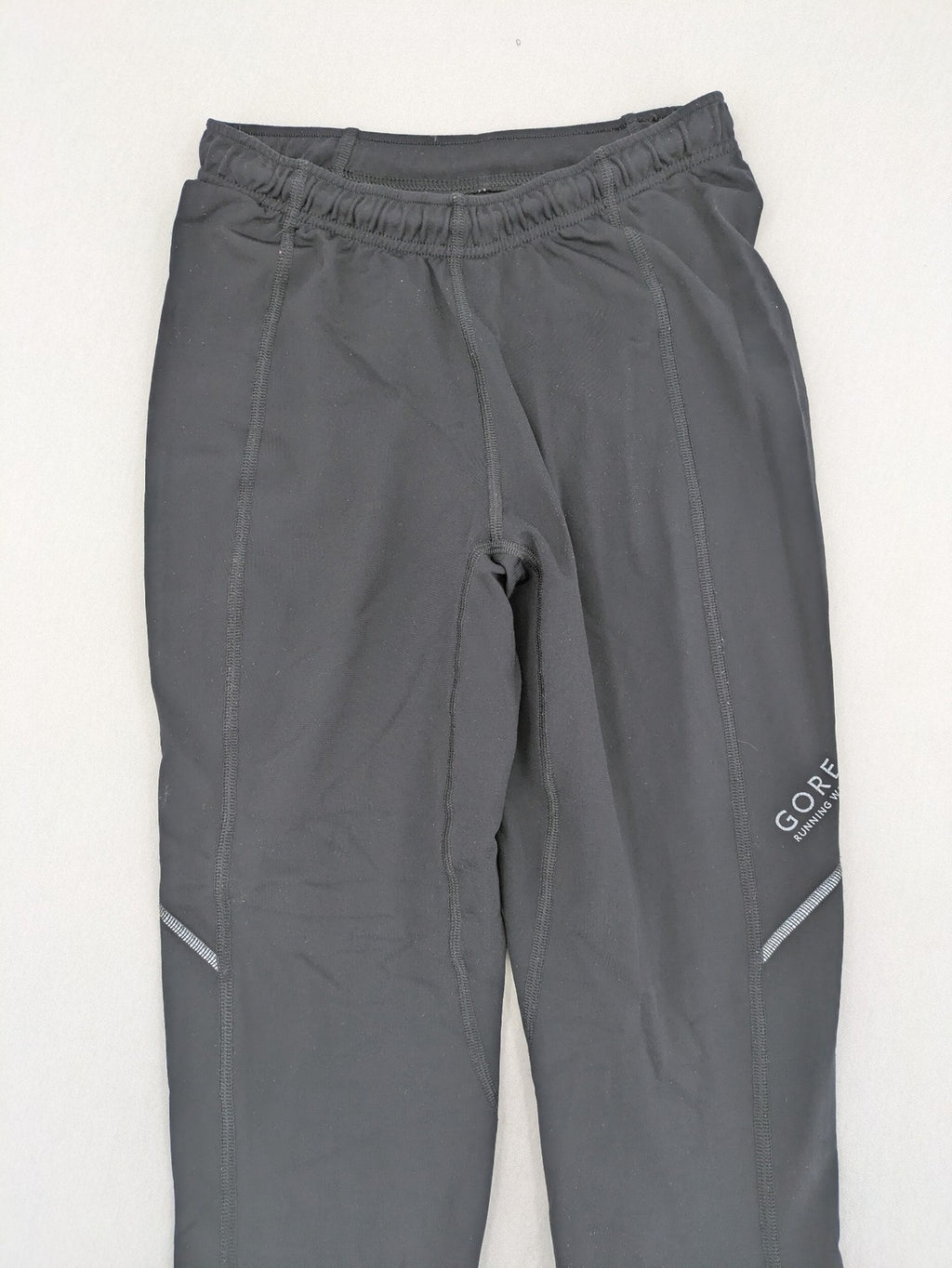 GORE RUNNING WEAR black bicycle tights with reflective details and zippered ankle openings.