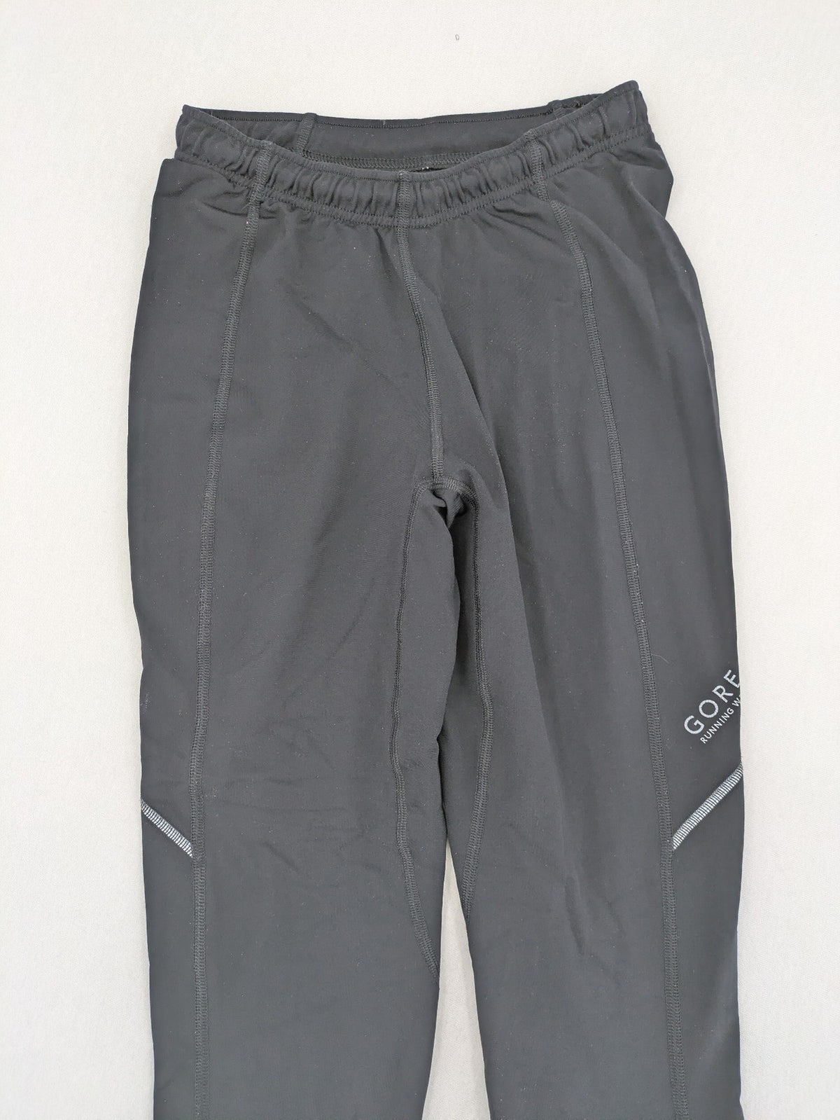 GORE RUNNING WEAR black bicycle tights with reflective details and zippered ankle openings.