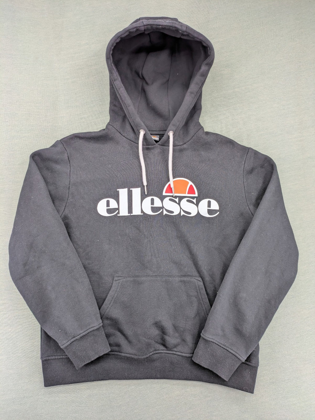 Ellesse grey hoodie with large logo, kangaroo pocket, and drawstring hood.