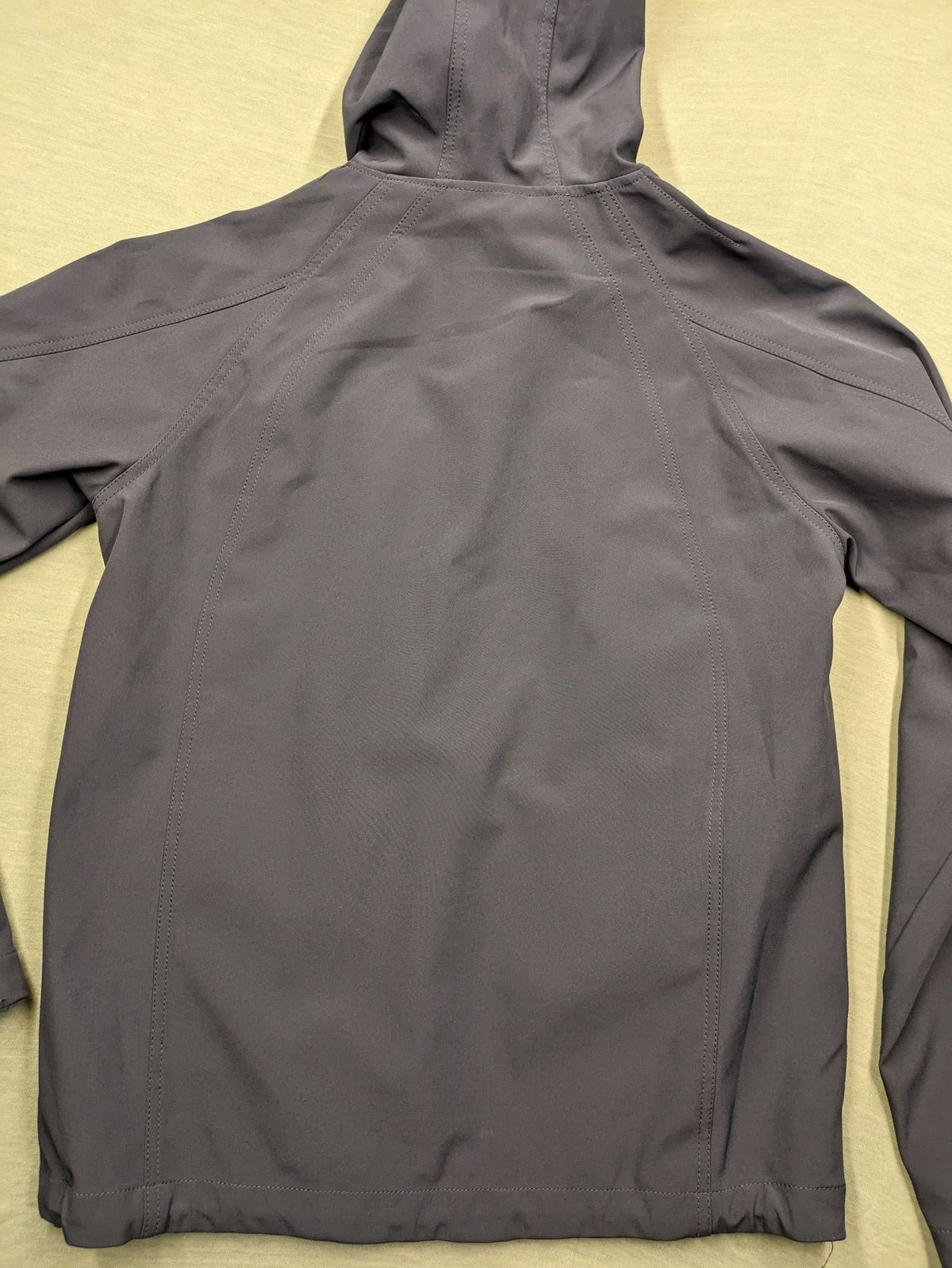 Life Line grey softshell jacket with adjustable hood and durable wind-resistant material.