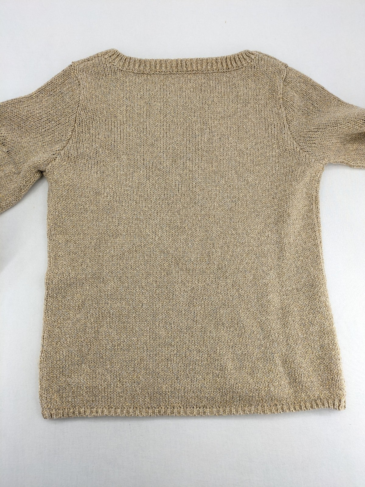 Rick Cardona beige turtle neck jumper with gold metallic thread and balloon sleeves.