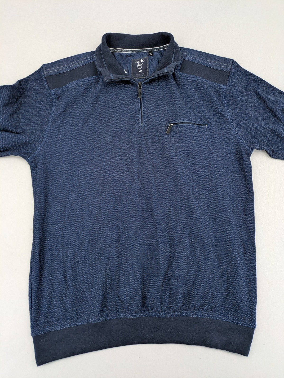 Hajo navy turtle neck jumper with herringbone pattern, zip collar, and chest pocket.