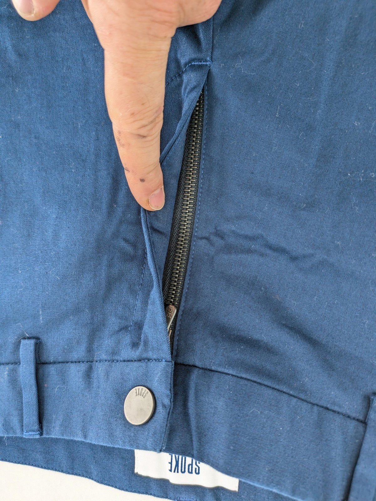 Spoke navy chino shorts flat front with unique printed pocket lining.