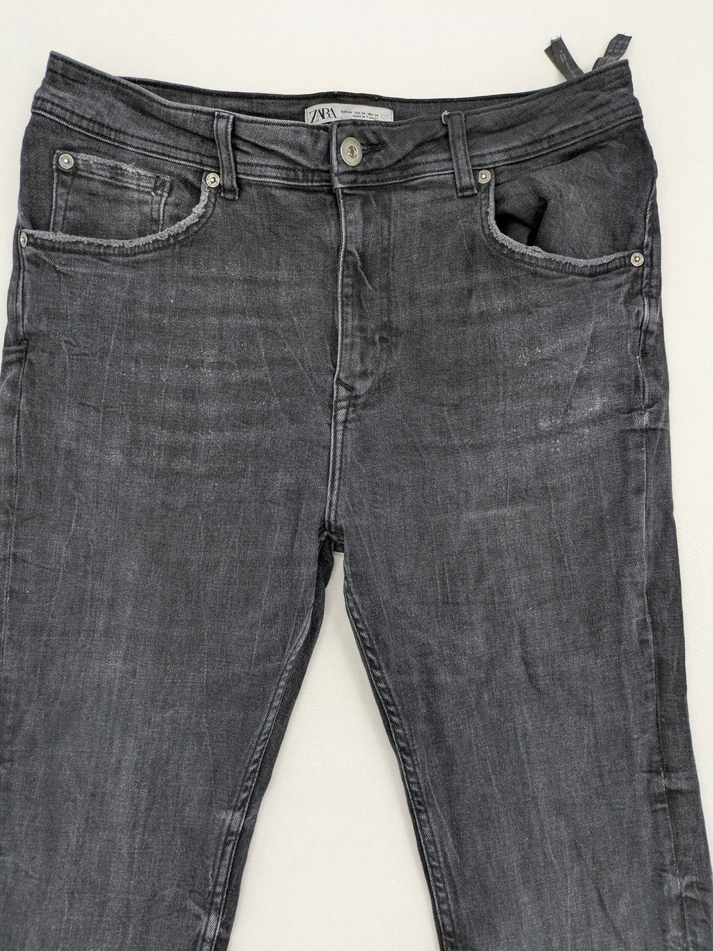 Zara slim fit jeans grey washed with distressed details and frayed hem.