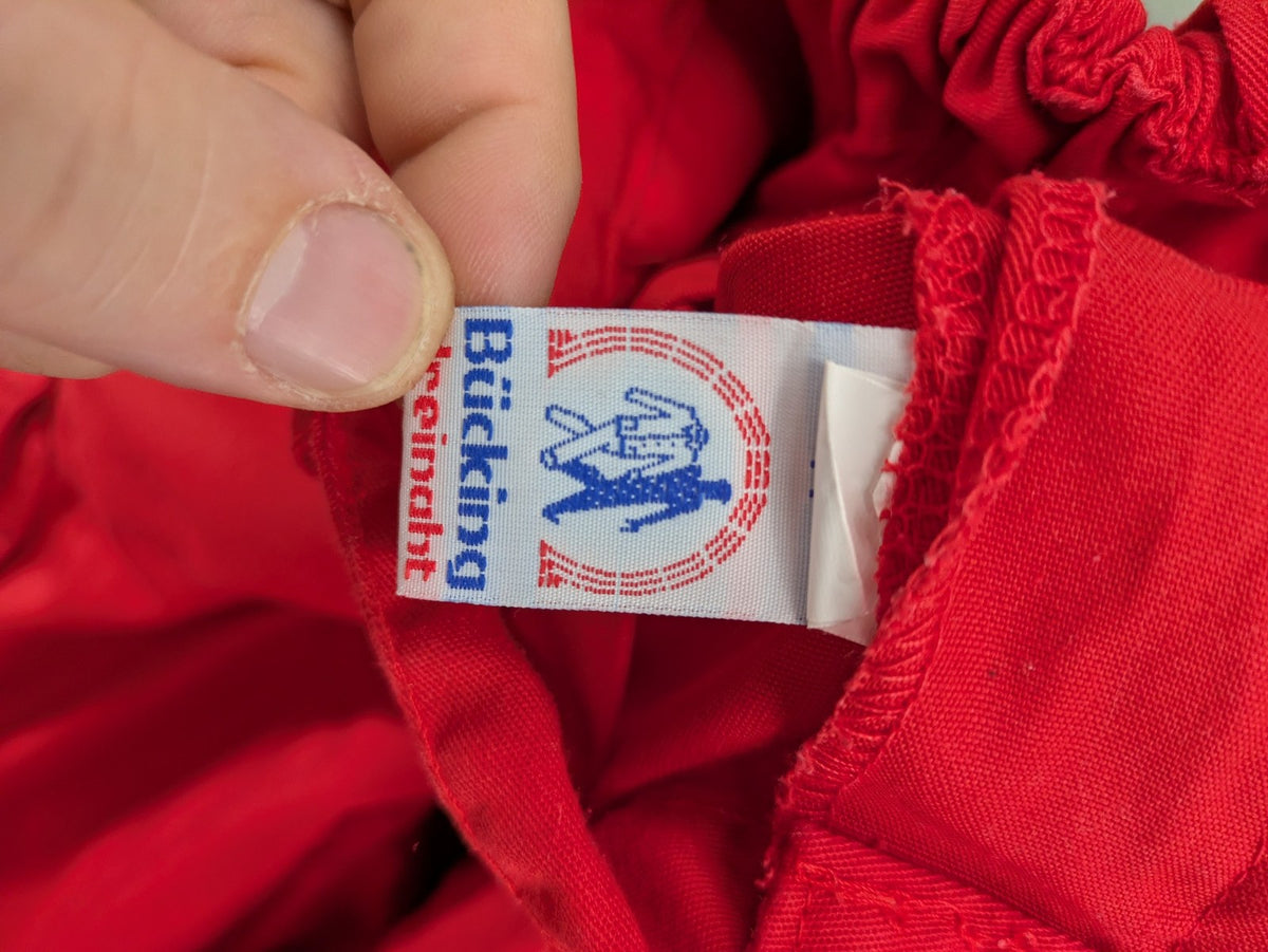 Bücking grey cargo work pants red accents with 3M Scotchlite reflective strips.
