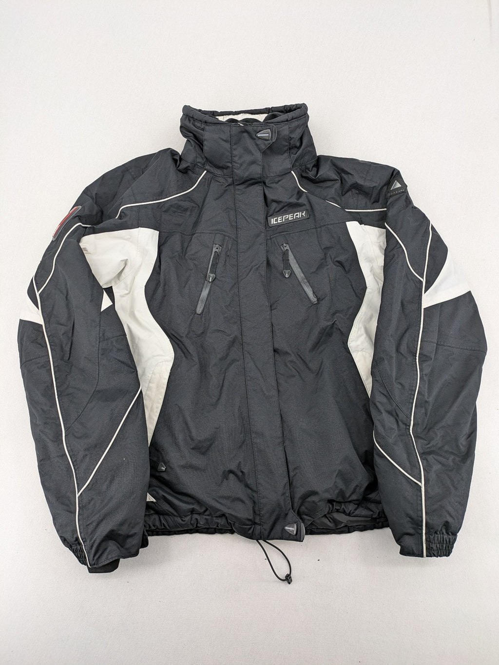 Icepeak black and white ski snowboard jacket with RECCO logo and quilted insulation.